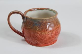 Coffee or tea mug, big structured  belly and two color glaze 