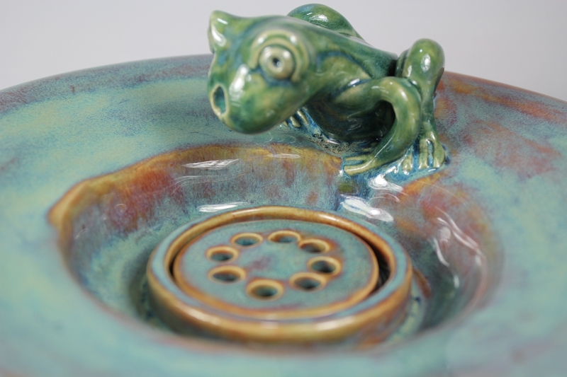 pet drinking fountain with a large secured coon lid and frog spout