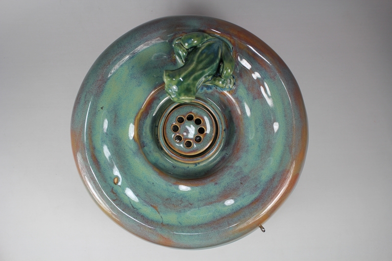 pet drinking fountain with a large secured coon lid and frog spout