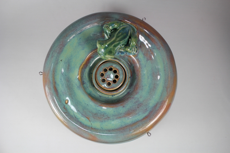 pet drinking fountain with a large secured coon lid and frog spout