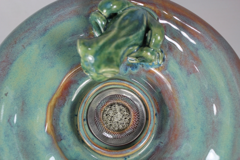 pet drinking fountain with a large secured coon lid and frog spout