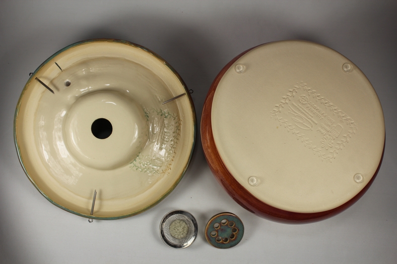 pet drinking fountain with a large secured coon lid and frog spout