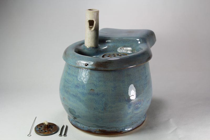 Small cordless pet fountain with trunk spout and internal battery