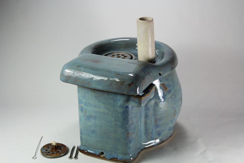 Small cordless pet fountain with trunk spout and internal battery