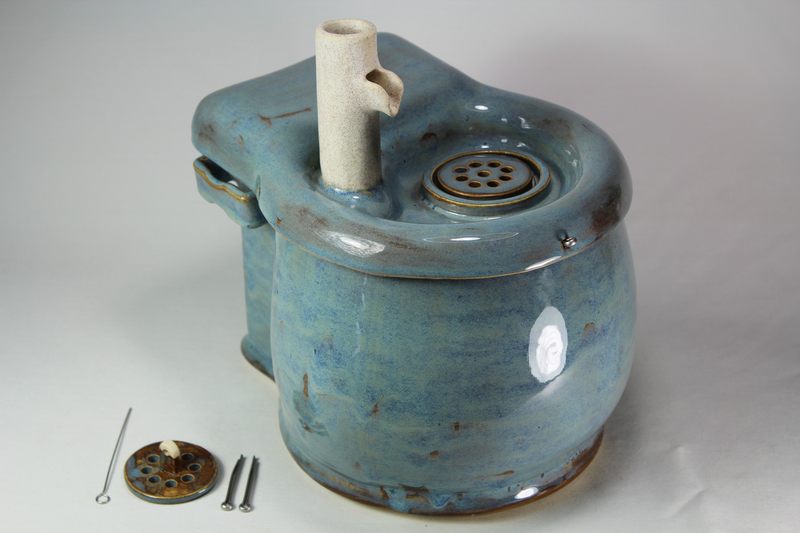 Small cordless pet fountain with trunk spout and internal battery