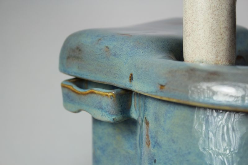 Small cordless pet fountain with trunk spout and internal battery