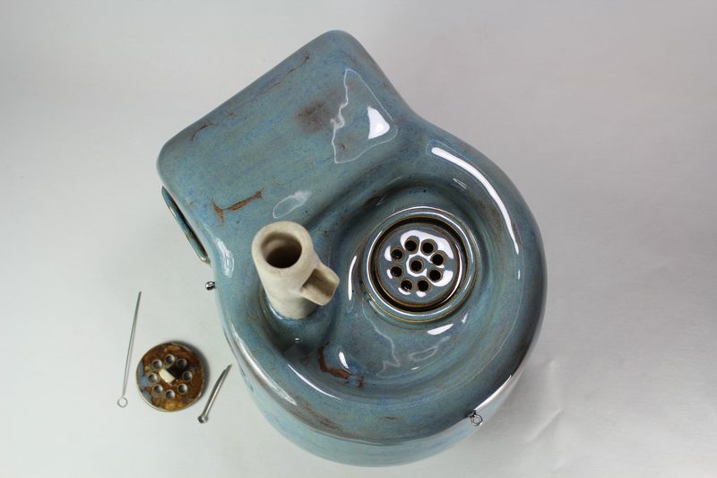 Small cordless pet fountain with trunk spout and internal battery