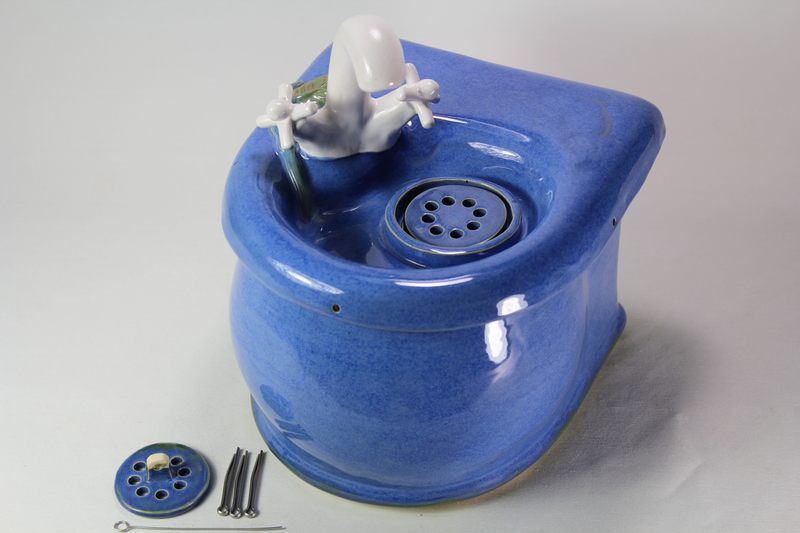 Small cordless pet fountain with faucet spout and internal battery